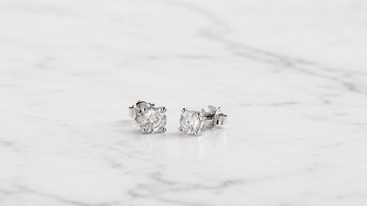 Certified lab-grown diamond ring on white marble — Stella Fine Jewellery