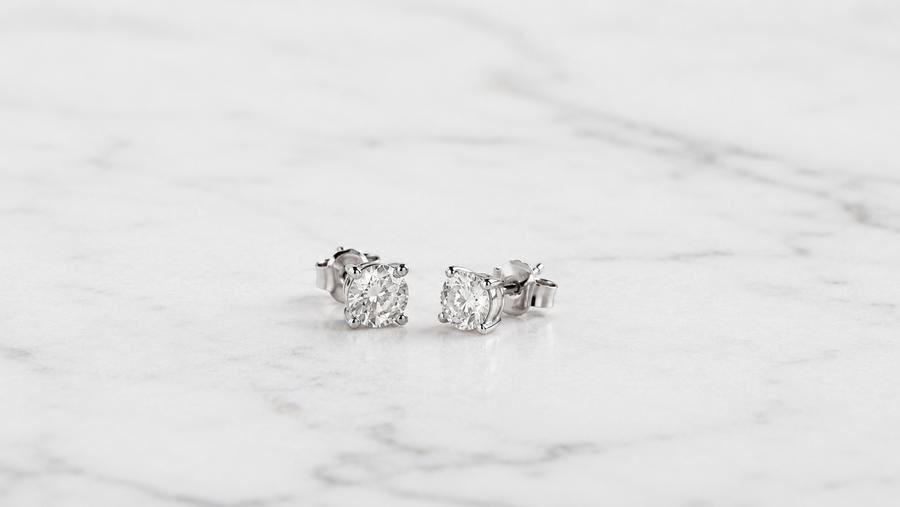 Certified lab-grown diamond ring on white marble — Stella Fine Jewellery