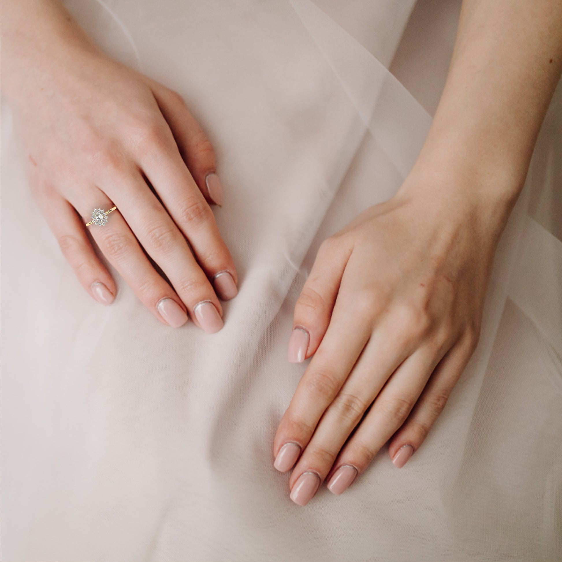 Yellow Gold Oval Halo Ring Hand